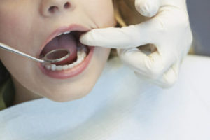 This is a picture of a child having a dental exam