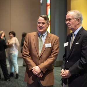 This is a picture of David Hadden and David Newton standing next to each other and talking during the Connecticut Health Foundation's 2018 thought event.