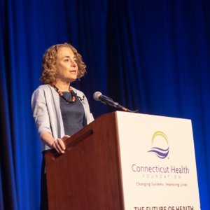 This is a photo of Elisabeth Rosenthal speaking at our April 25, 2018 event.
