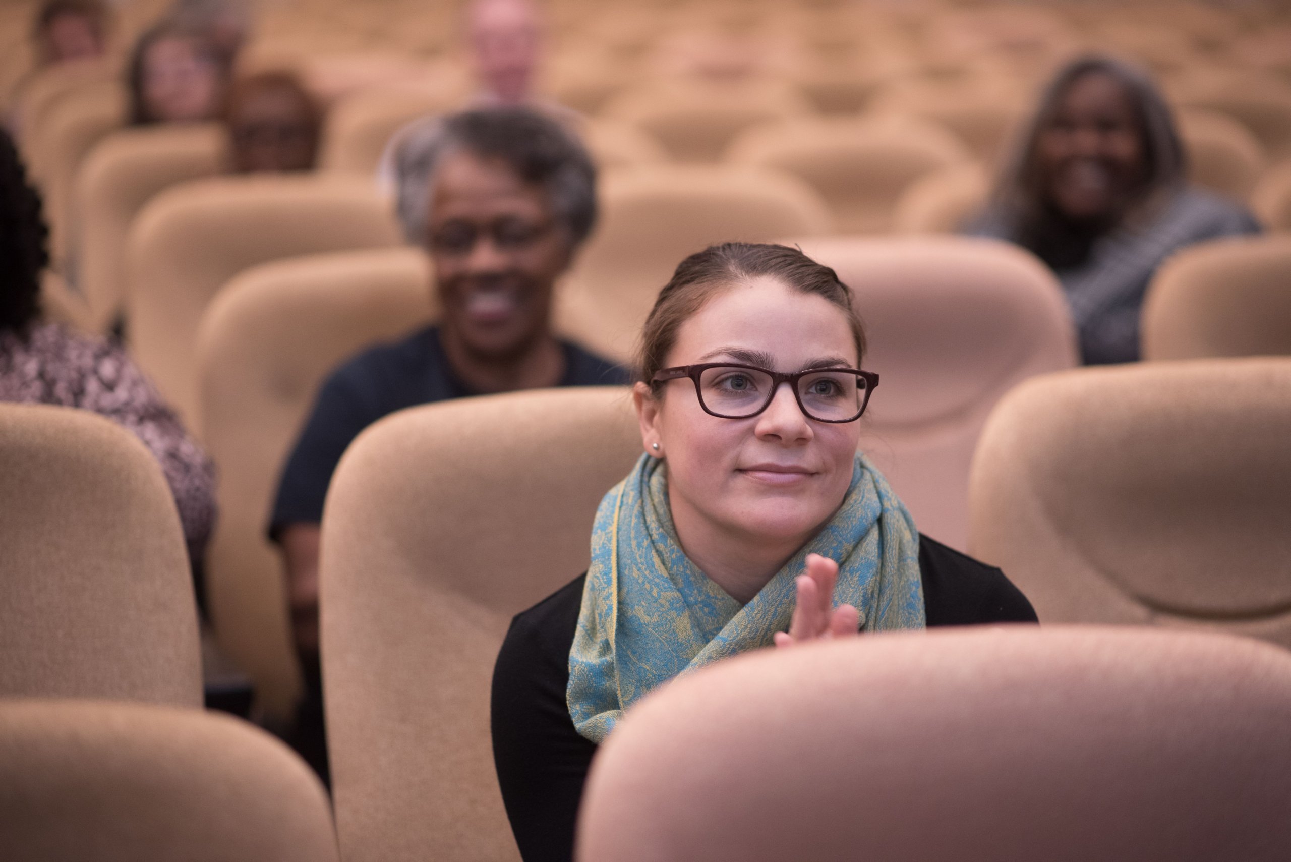 This is a photo of Brittney listening to a ministerial health fellowship meeting.